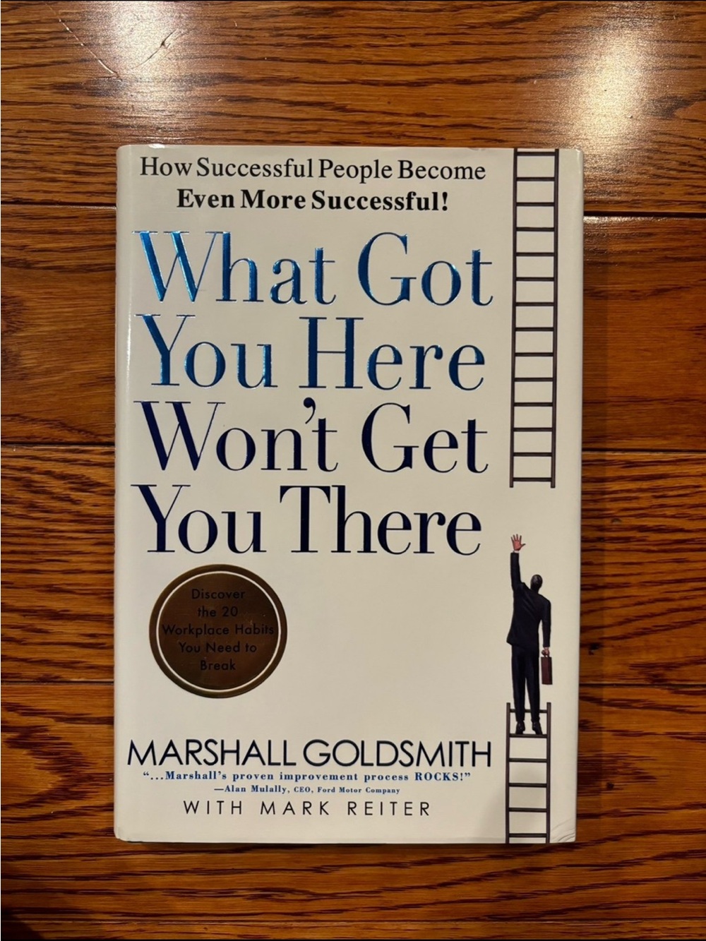 What Got You Here Won't Get You There by Marshall Goldsmith - White & Blue Cover
